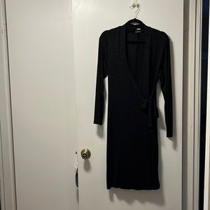 Long sleeve cocktail dress with cross body tie